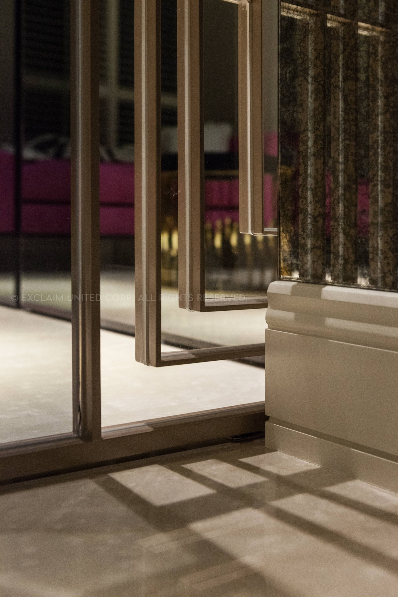 In the apartment’s main living area, arts and French boutique culture and complimentary lime greens and lavender tones simultaneously unite and define the living and dining rooms.